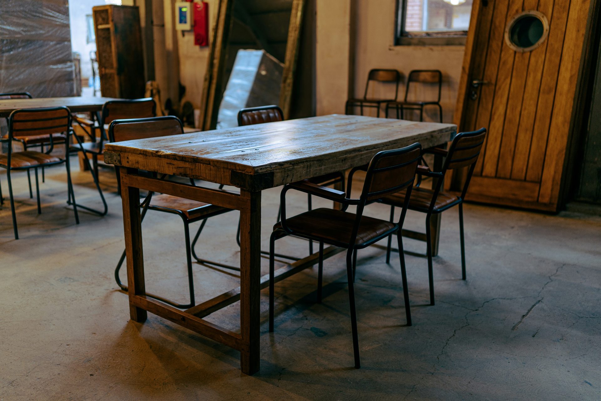 brown wooden table with chairs